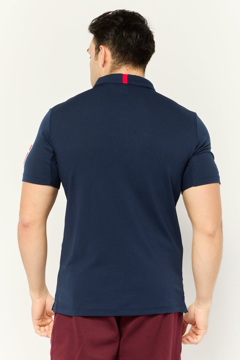 PUMA تي شيرت بولو جولف للرجال بأكمام قصيرة مزخرفة، لون كحلي - Image 4